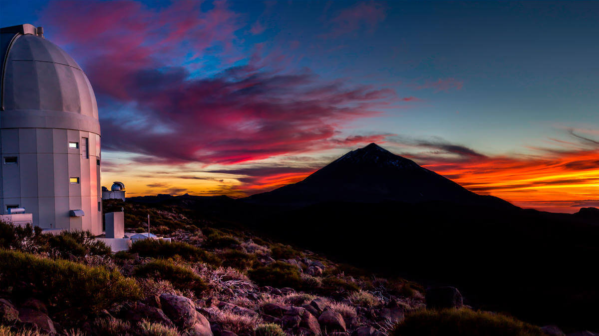 outside of teide astronomical observatory with sunset